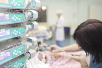 Nurse with newborn - Suing for Birth Injury